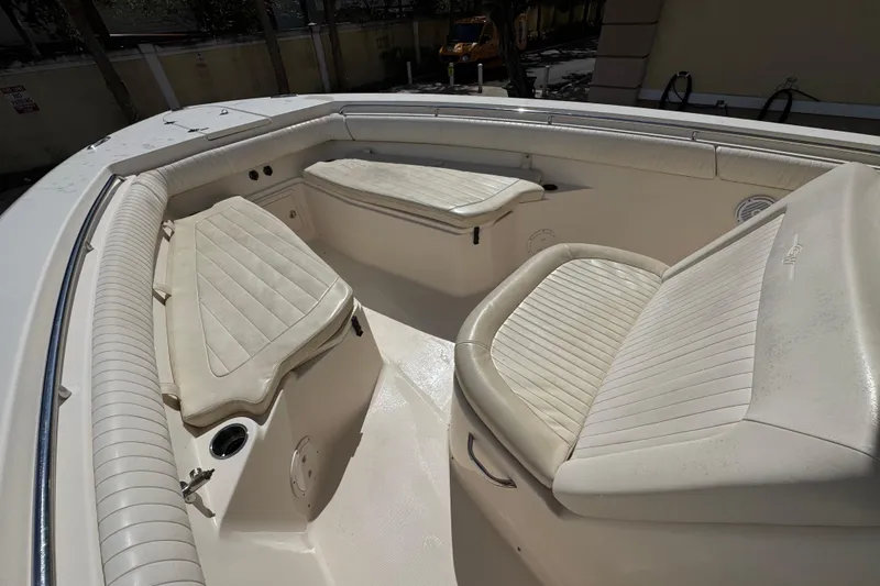 Slide: The Image of 2014 Grady-White Canyon 336 boat interior with cushioned seating. - 20