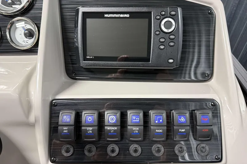 Slide: The Image of Control panel of 2026 Sylvan MIRAGE X1 CLZ DH with Humminbird Helix 5 display and switches. - 11