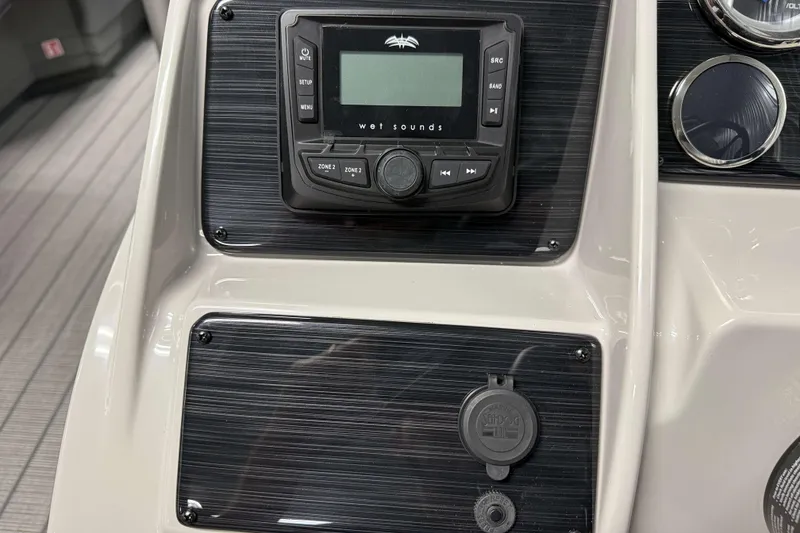 Slide: The Image of 2026 Sylvan MIRAGE X1 CLZ DH dashboard with audio controls and gauges. - 12