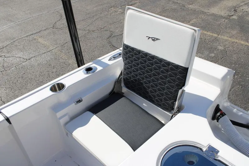 Slide: The Image of 2026 Tidewater 2110 Bay Max boat seat with cup holders and storage compartment. - 13