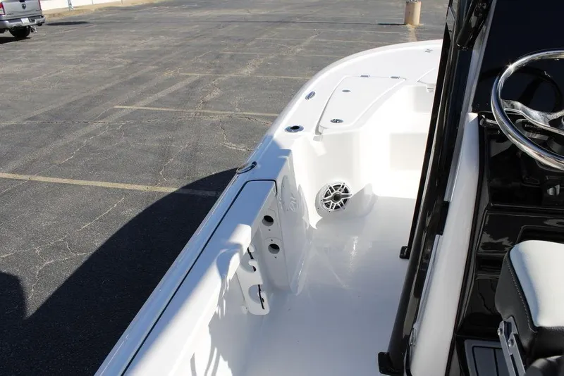 Slide: The Image of 2026 Tidewater 2110 Bay Max boat interior with steering wheel and seating. - 19
