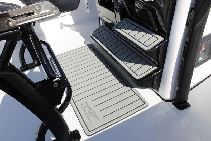 Slide: The Image of 2026 Tidewater 2110 Bay Max boat interior with sleek, modern design and non-slip flooring. - 23