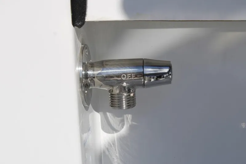 Slide: The Image of Chrome valve on 2026 Tidewater 2110 Bay Max boat, marked "OFF." - 25