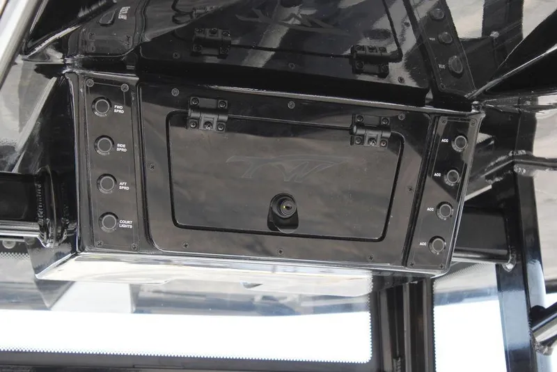 Slide: The Image of Control panel of 2026 Tidewater 2110 Bay Max boat with various switches. - 30