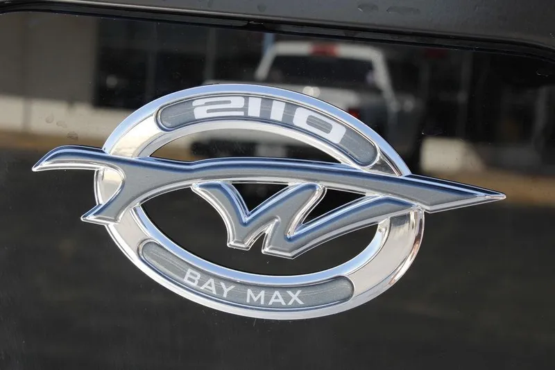 Slide: The Image of 2026 Tidewater 2110 Bay Max logo on a sleek black surface. - 34