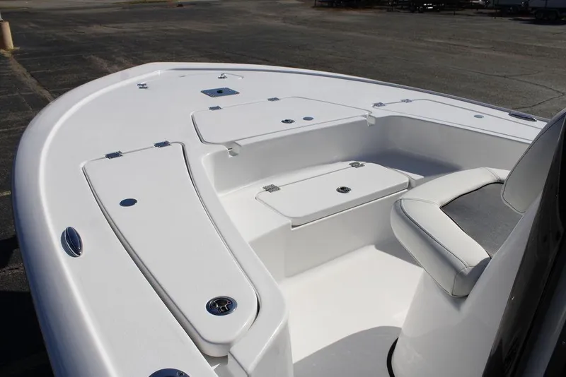 Slide: The Image of 2026 Tidewater 2110 Bay Max boat interior with seating and storage compartments. - 35