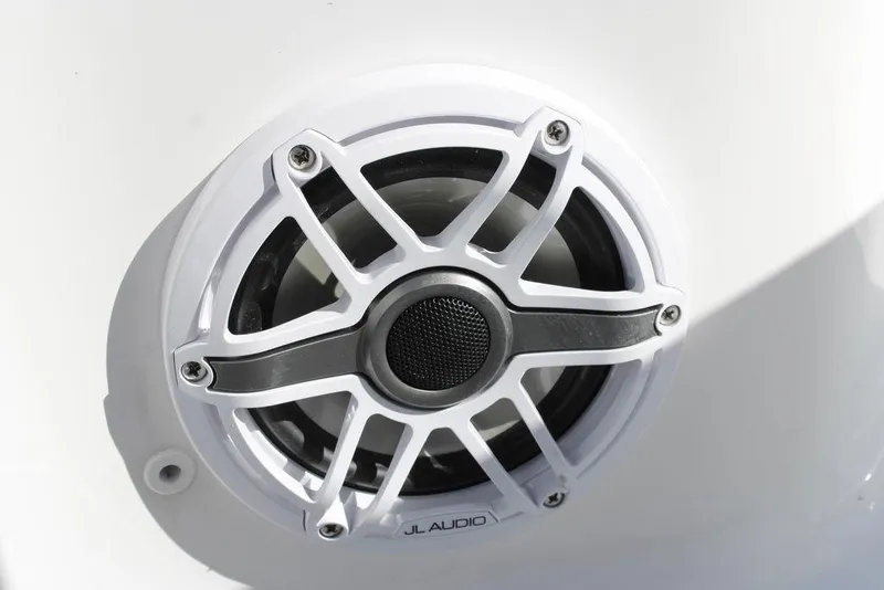 Slide: The Image of Close-up of JL Audio speaker on 2026 Tidewater 2110 Bay Max boat. - 37