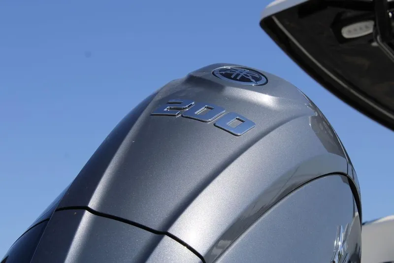 Slide: The Image of 2026 Tidewater 2110 Bay Max with Yamaha 200 outboard motor, close-up view. - 8