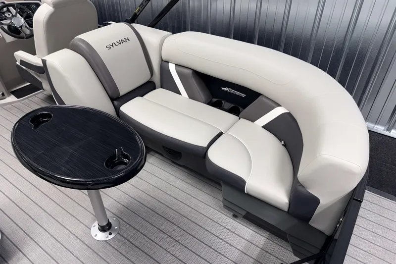 Slide: The Image of Luxurious seating in the 2026 Sylvan Mirage X3 boat with sleek design and cup holders. - 15