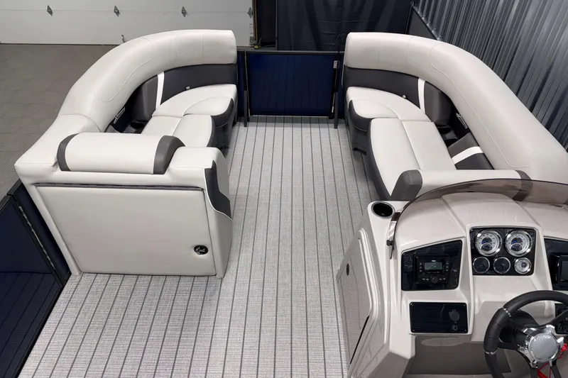 Slide: The Image of 2026 Sylvan Mirage X3 boat interior with luxurious seating and modern dashboard. - 5