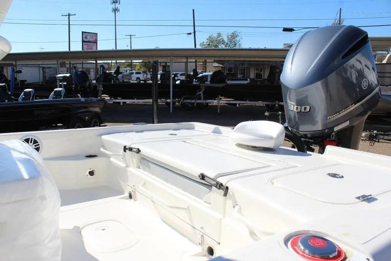 Slide: The Image of 2026 Skeeter SX241 boat with Yamaha 300 engine, displayed outdoors. - 12