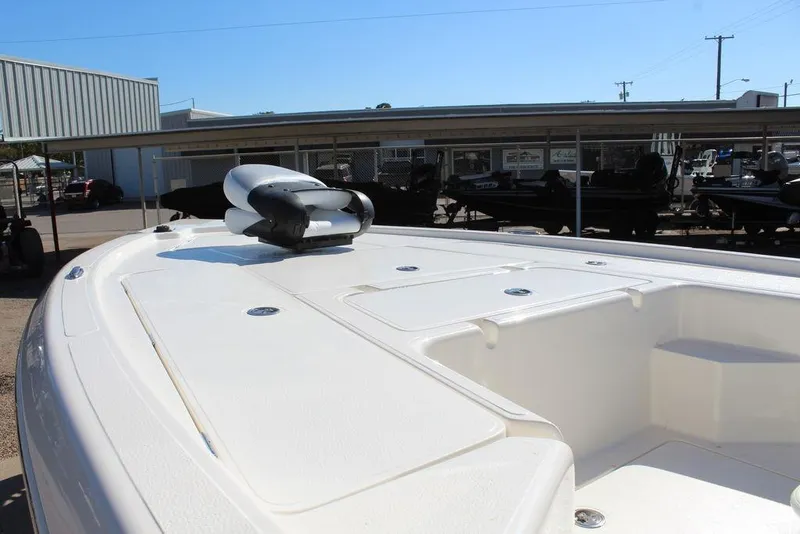 Slide: The Image of 2026 Skeeter SX241 boat deck with storage compartments and mounted equipment. - 13