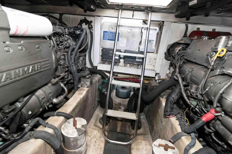 Slide: The Image of Luxurious cabin interior of 2005 Sabre 38 Hardtop Express with cozy bed and wooden finish. - 30