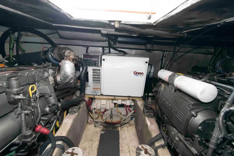Slide: The Image of Engine room of 2005 Sabre 38 Hardtop Express with Onan marine generator. - 32
