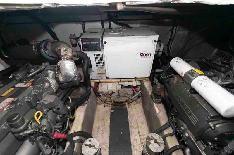 Slide: The Image of Engine room of 2005 Sabre 38 Hardtop Express with Onan marine generator. - 33