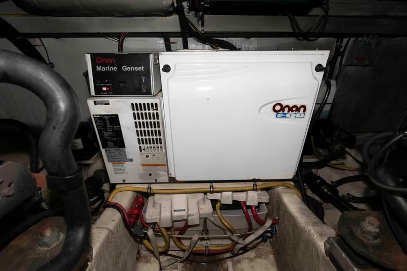 Slide: The Image of Onan marine generator in 2005 Sabre 38 Hardtop Express engine room. - 34