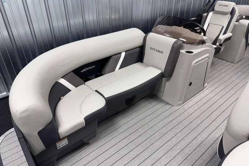 Slide: The Image of 2026 Sylvan Mirage X3 boat interior with sleek seating and modern design. - 1