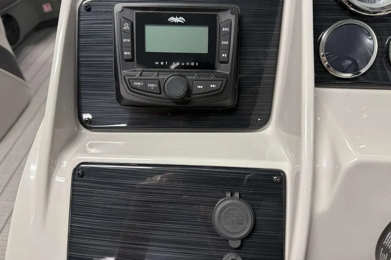 Slide: The Image of 2026 Sylvan Mirage X3 dashboard with Wet Sounds audio system and control panel. - 10