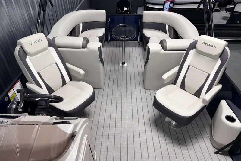 Slide: The Image of Interior of 2026 Sylvan Mirage X3 pontoon boat with luxurious seating and modern design. - 3