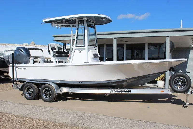 The Image of 2025 Tidewater 2210 Carolina Bay boat on trailer, parked outdoors. - 0