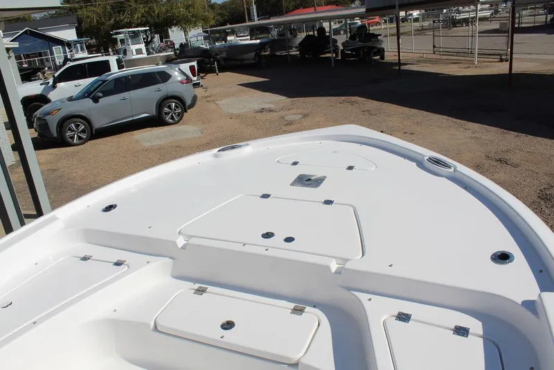 Slide: The Image of 2025 Tidewater 2210 Carolina Bay boat deck in a parking lot. - 18