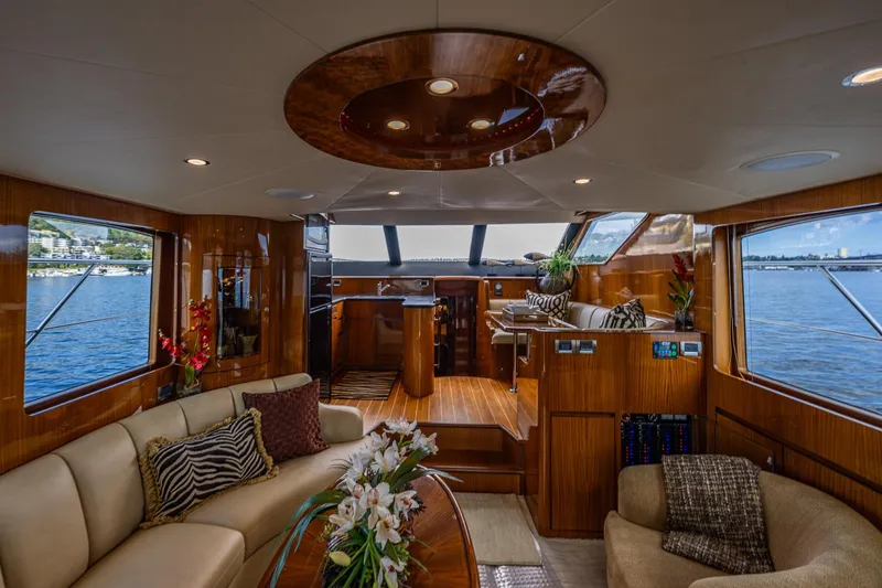 Slide: The Image of Luxurious interior of 2009 Ocean Alexander 52 Sedan yacht with elegant wood finishes and plush seating. - 22