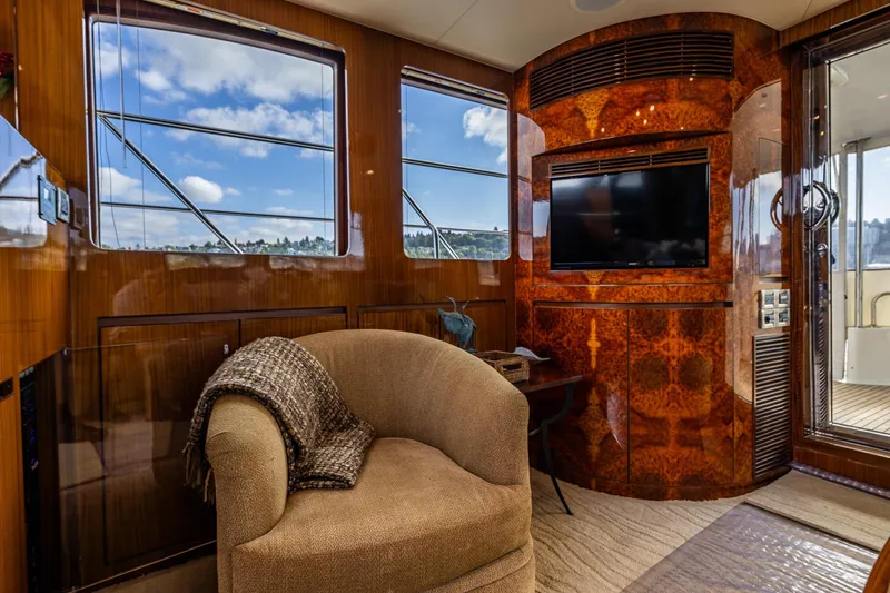Slide: The Image of Luxurious interior of 2009 Ocean Alexander 52 Sedan yacht with plush seating and elegant wood paneling. - 26