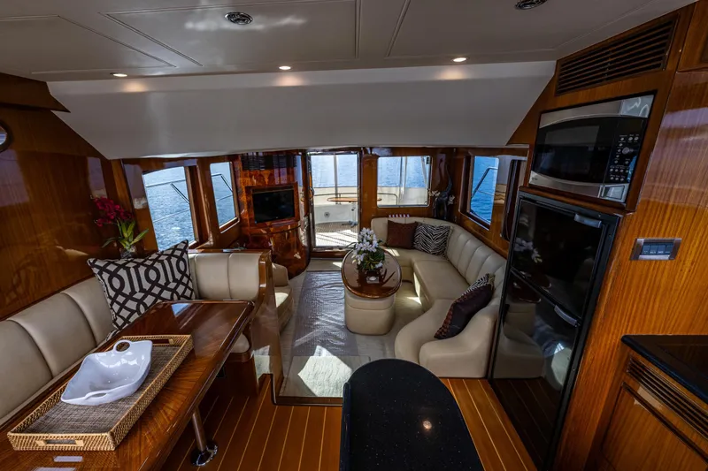 Slide: The Image of Salon of 2009 Ocean Alexander 52 Sedan yacht with elegant seating and modern amenities. - 28