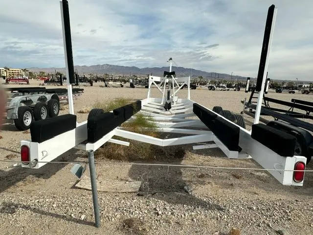 Slide: The Image of Boat trailer on gravel lot, designed for Carver C34 Command Bridge, 2016 model. - 26