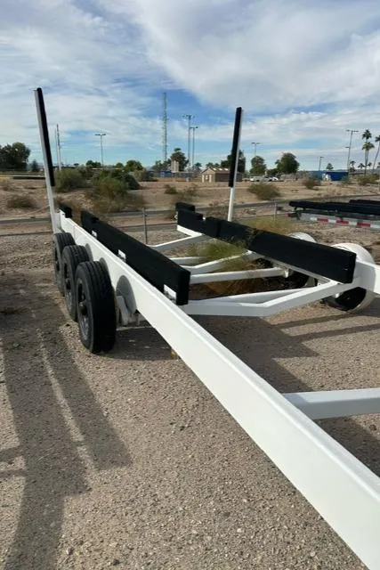 Slide: The Image of Boat trailer for 2016 Carver C34 Command Bridge on gravel lot. - 31