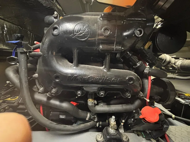 Slide: The Image of Engine compartment of a 2016 Carver C34 Command Bridge with MerCruiser components. - 34