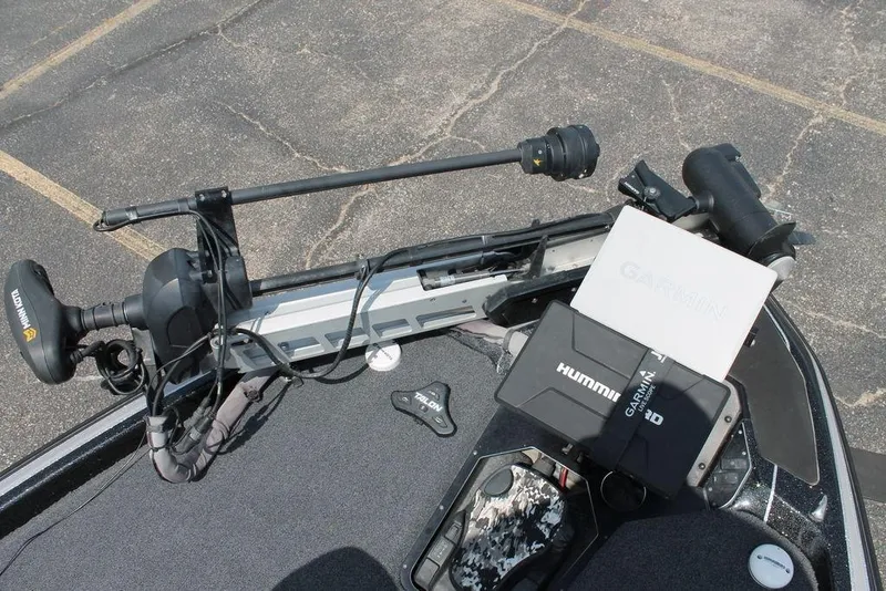 Slide: The Image of 2021 Skeeter FXR21 boat with Garmin and Humminbird electronics on deck. - 8