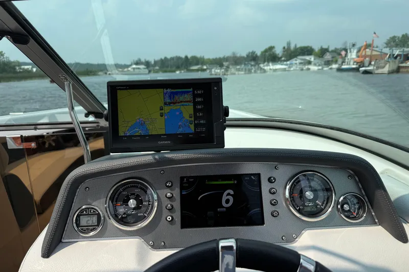 Slide: The Image of Dashboard of a 2016 Regal 2500 Bowrider with Garmin navigation system. - 4