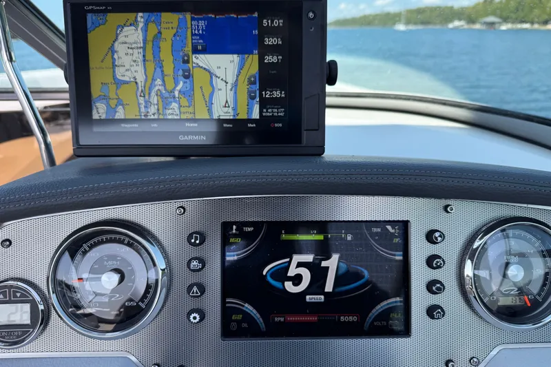 Slide: The Image of Dashboard of a 2016 Regal 2500 Bowrider with Garmin GPS and speedometer. - 5