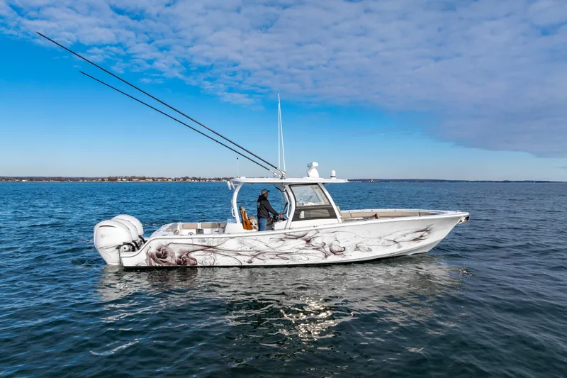 The Image of 2022 Sportsman Open 352 Center Console boat on calm ocean waters. - 0