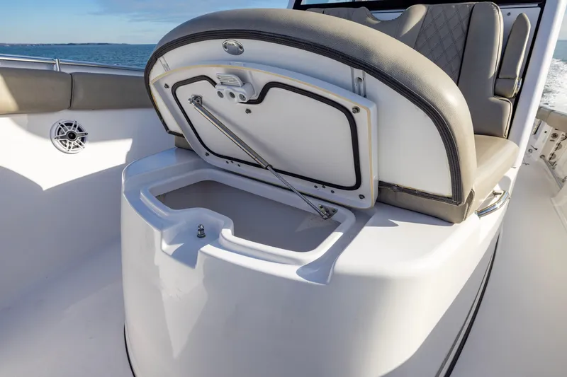 Slide: The Image of 2022 Sportsman Open 352 Center Console boat with open storage compartment. - 17