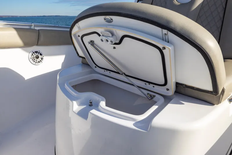 Slide: The Image of 2022 Sportsman Open 352 Center Console storage compartment detail. - 18