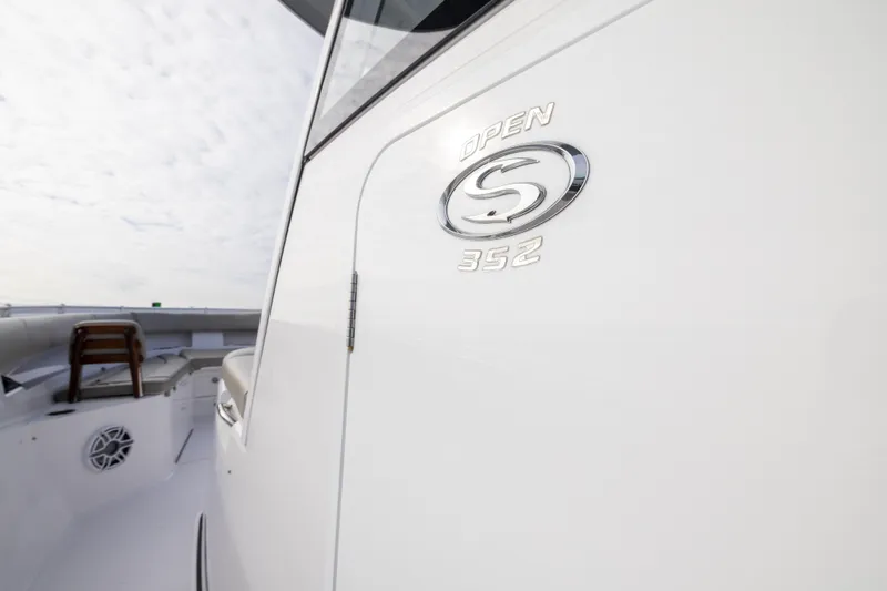 Slide: The Image of 2022 Sportsman Open 352 Center Console boat, sleek design, close-up view. - 19