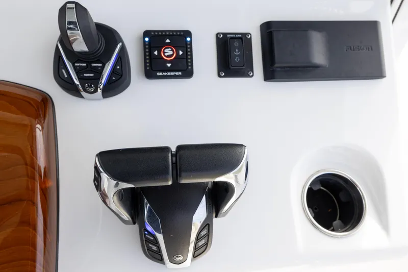 Slide: The Image of Control panel of 2022 Sportsman Open 352 Center Console boat with joystick and Seakeeper display. - 26