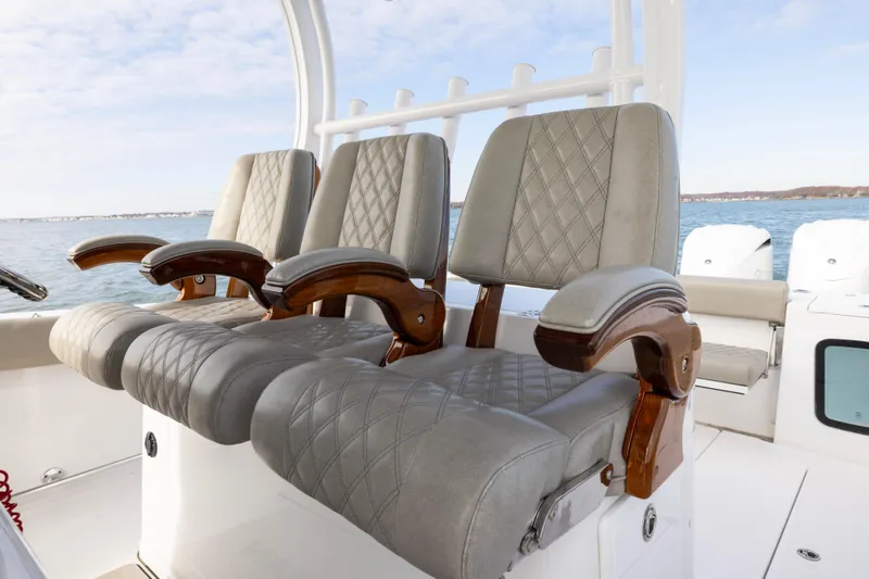 Slide: The Image of Luxurious seating on 2022 Sportsman Open 352 Center Console boat, featuring elegant design. - 33