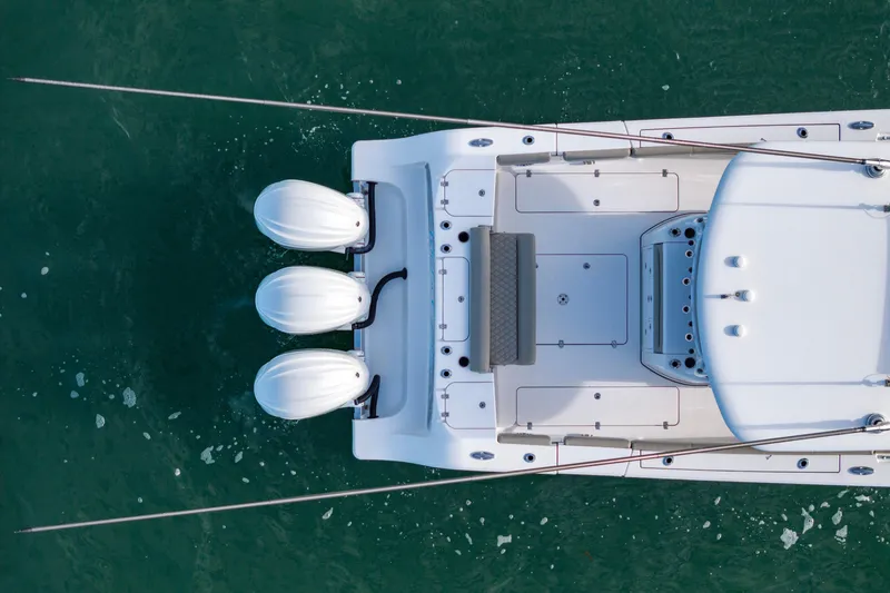 Slide: The Image of Aerial view of 2022 Sportsman Open 352 Center Console boat on water. - 44