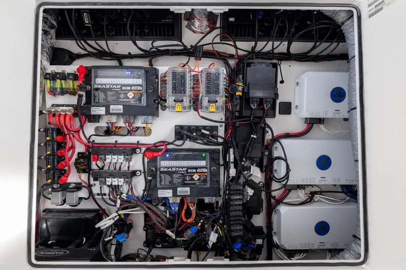 Slide: The Image of 2022 Sportsman Open 352 Center Console electrical system with SeaStar components and wiring. - 52