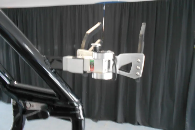 Slide: The Image of 2023 Moomba Max boat accessory with black and silver components. - 12