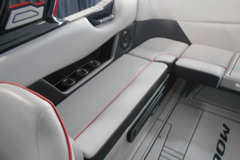 Slide: The Image of 2023 Moomba Max interior with sleek seating and cup holders. - 20