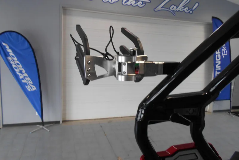 Slide: The Image of 2023 Moomba Max boat accessory display with banners in showroom. - 22