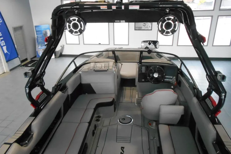 Slide: The Image of 2023 Moomba Max boat interior with sleek seating and advanced dashboard features. - 9