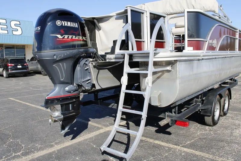 Slide: The Image of 2021 SunCatcher Select 22C pontoon boat with Yamaha VMAX engine on trailer. - 1
