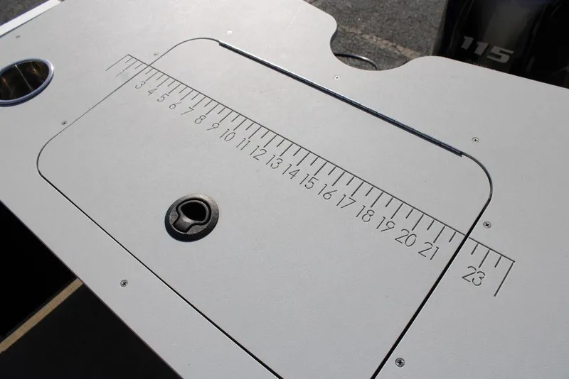 Slide: The Image of SunCatcher Select 22C 2021 boat deck with built-in measuring ruler and cup holder. - 26