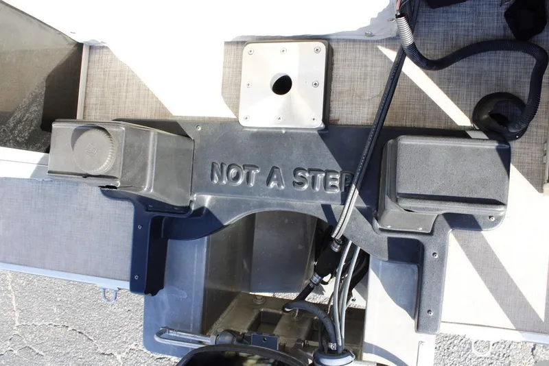 Slide: The Image of Rear view of 2021 SunCatcher Select 22C boat with "Not a Step" warning. - 28