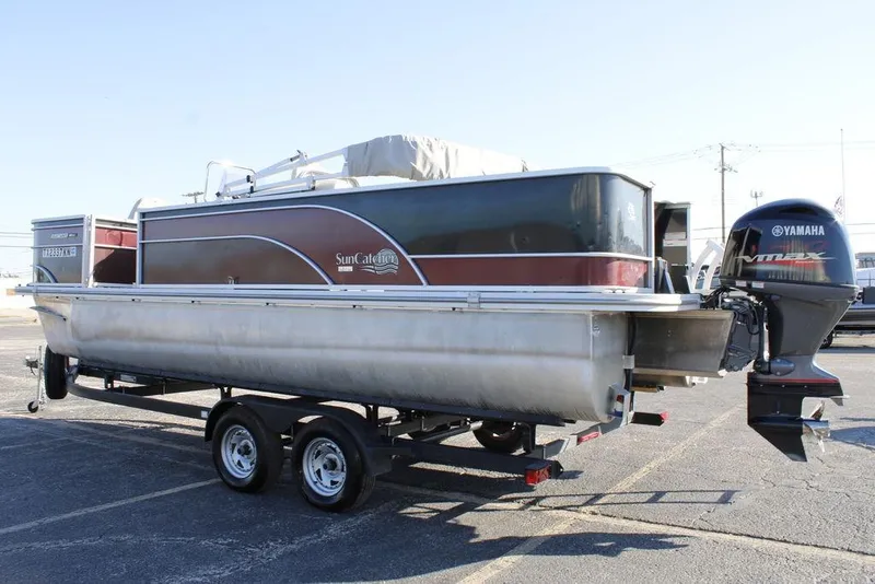 Slide: The Image of 2021 SunCatcher Select 22C pontoon boat with Yamaha outboard motor on trailer. - 31